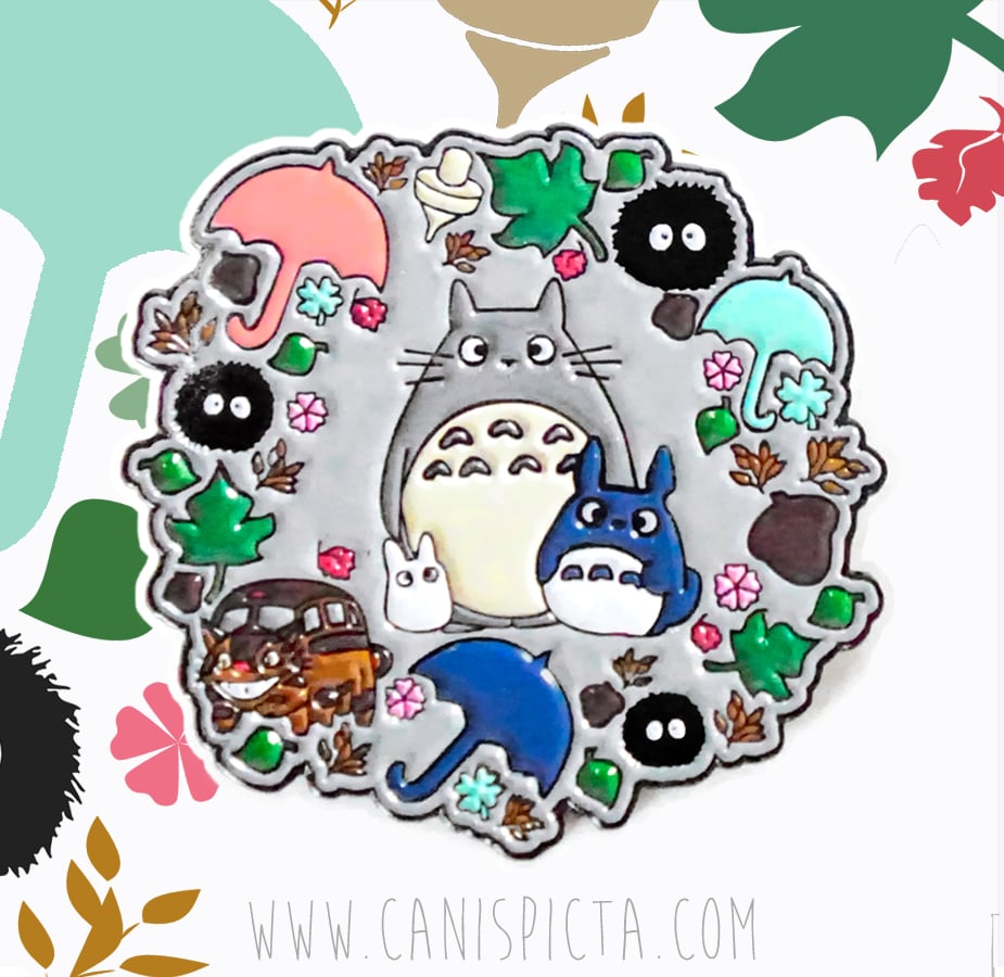 https://assets.bigcartel.com/product_images/192408430/totoro_wreath_actual_pin_stylized.jpg?auto=format&fit=max&h=1000&w=1000