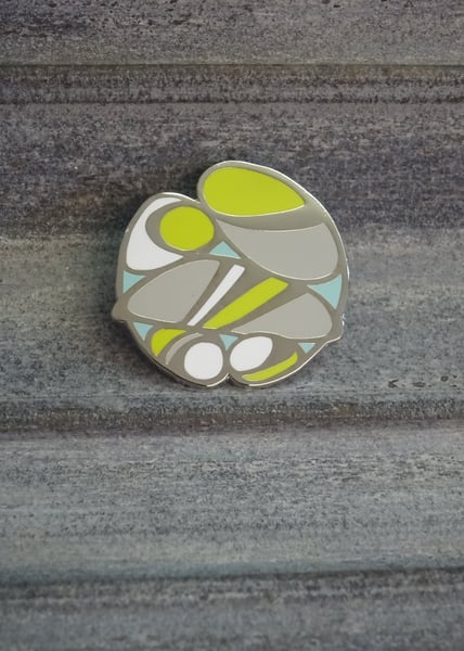 Image of Pebble pin badge