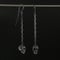 Image of Hanging Skulls Earrings