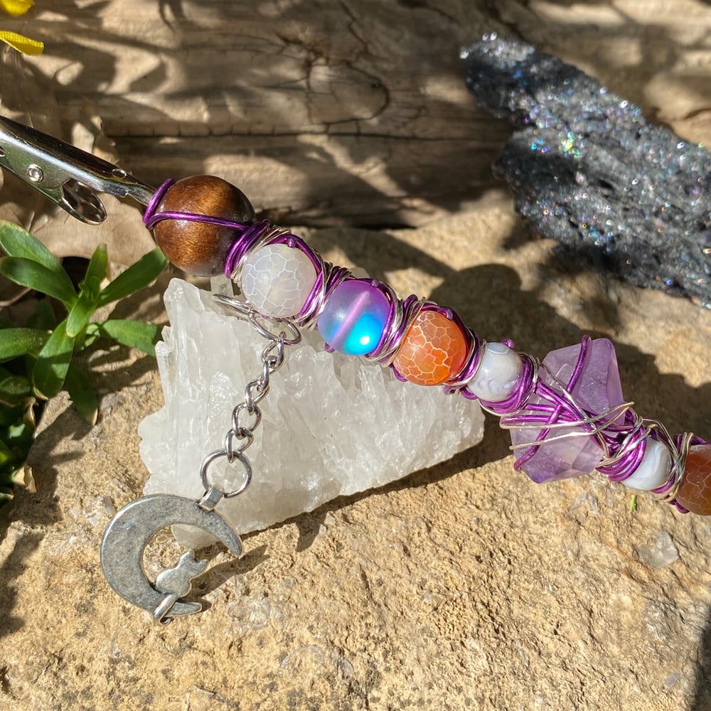 Image of violet sunset roach clip 