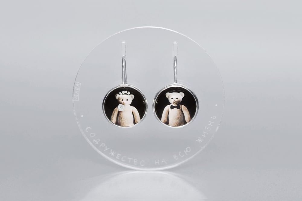 Image of "A union for the.." teddy-bear silver earrings with photos, rock crystal  · CONSORTIUM.. ·