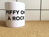 Piffy on a Rock Mug