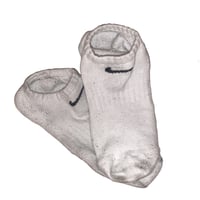 Used socks in poor condition, Nike brand.