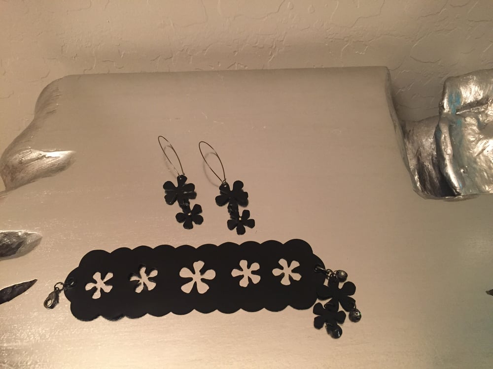 Image of Black Patient Leather flower earrings and bracelet