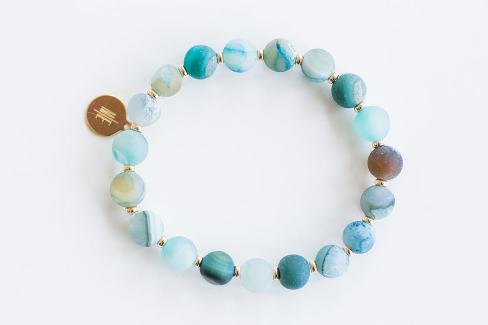 Image of jetsetter ME blue agate frosted