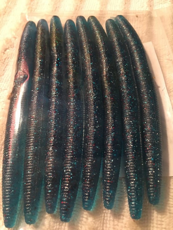 Image of Blue senkos with red , silver , and blue flake