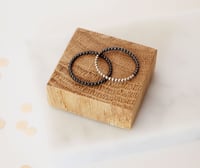 Image 2 of Black And White Stacking Rings