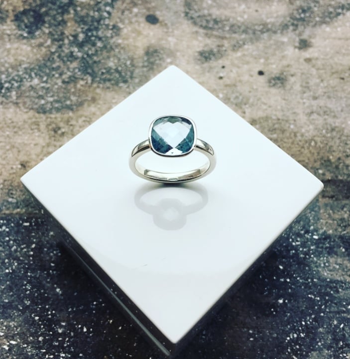 Image of Silver Ring set with a 10mm Cushion Cut Blue Topaz