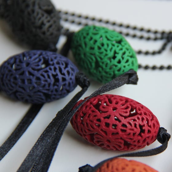 Image of 3D printed bead OVAL.floral 