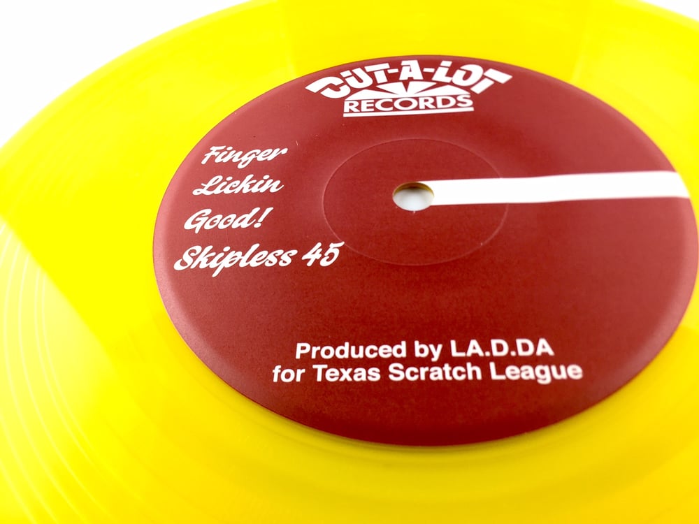 Image of D-STYLES X DJ LA.D.DA – FINGER LICKIN GOOD SKIPLESS 7″ (Yellow Transparent)
