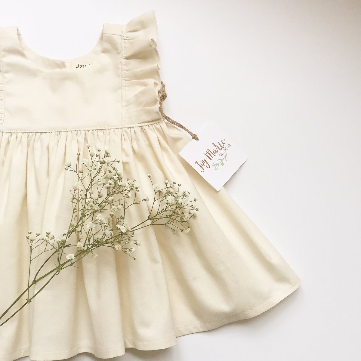 Image of The "Kelsey" dress in ivory
