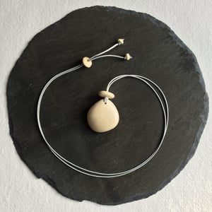 Image of Smooth pebble pendant