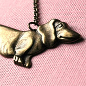 Image of Dixie the Weiner Dog necklace in brass
