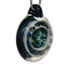 Pendant with Om Implosion