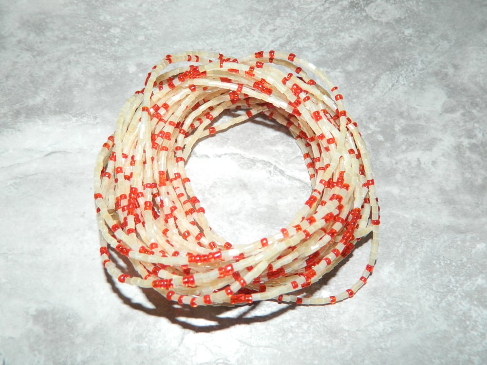 Image of White and red glass bead