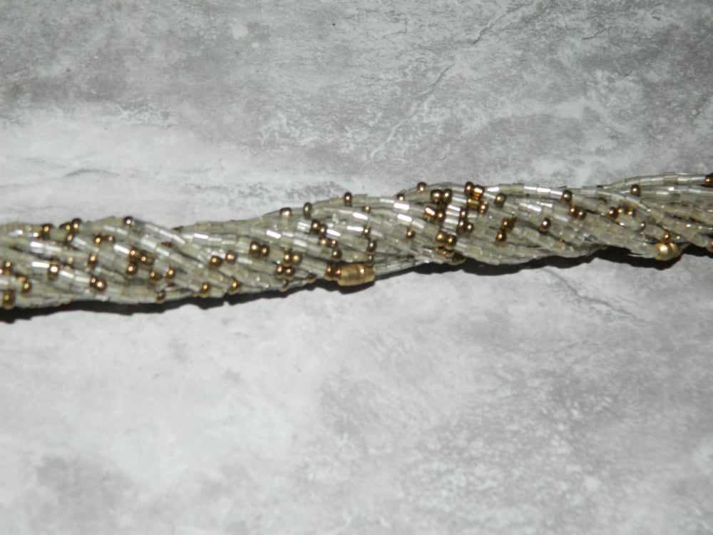Image of Clear and gold glass bead