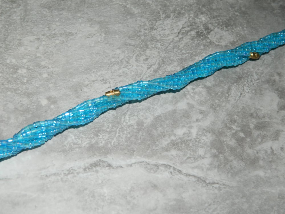 Image of Light blue glass waist bead
