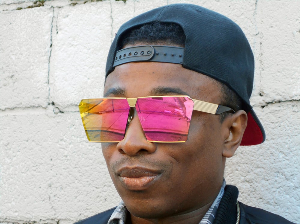 Image of Bambaataa: Trendy Oversized Square Gold Framed Sunglasses with Pink/Orange Mirrored Lenses