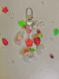 Image 3 of strawberry clay seal keychain 