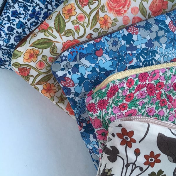 Image of Liberty print zip pouches