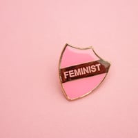 Image 3 of FEMINIST - enamel pin, shield, pink with gold plating, merit style badge