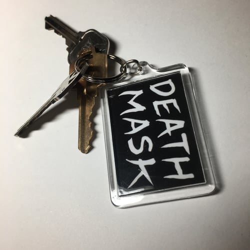 Image of Coward keychain