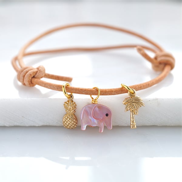 Image of Pink elephant ,pineapple and palm tree leather bracelet