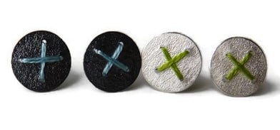 Image of Sewn Up Round studs