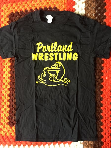 Image of Portland Wrestling logo on black tee