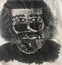 Image 2 of Guy wearing P Hat (white tshirt)