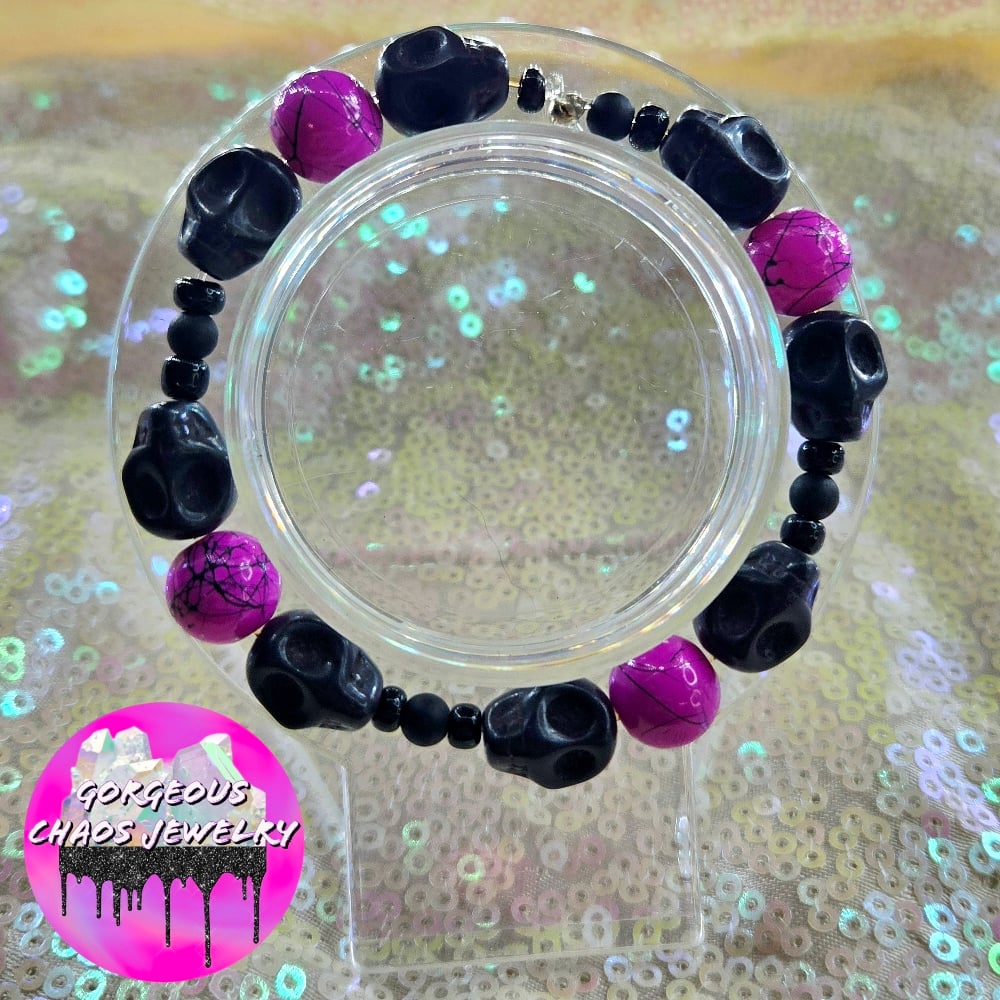 Image of Neon Purple with Black Skulls