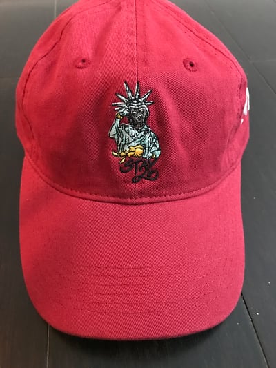 Image of The statue of LoLife Red Dad Hat