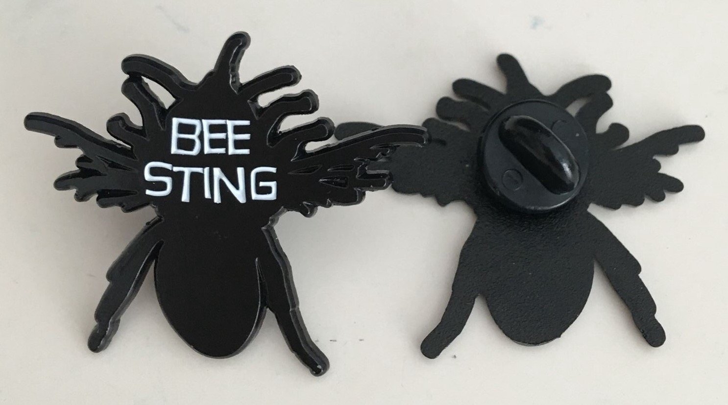 Image of Bee Sting enamel pin