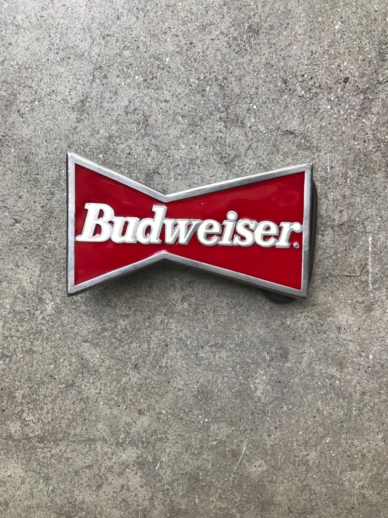 Image of Budweiser bowtie belt buckle.