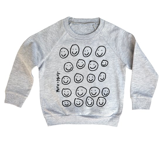 Image of A WORLD FILLED WITH SMILES SWEATSHIRT