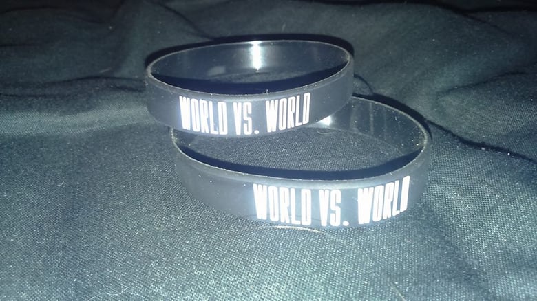 Image of WORLD VS. WORLD silicone wristband (1/2")