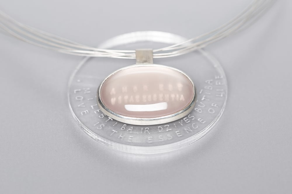 Image of "Love is the essence of life" silver pendant with rose quartz  · AMOR EST VITAE ESSENTIA ·