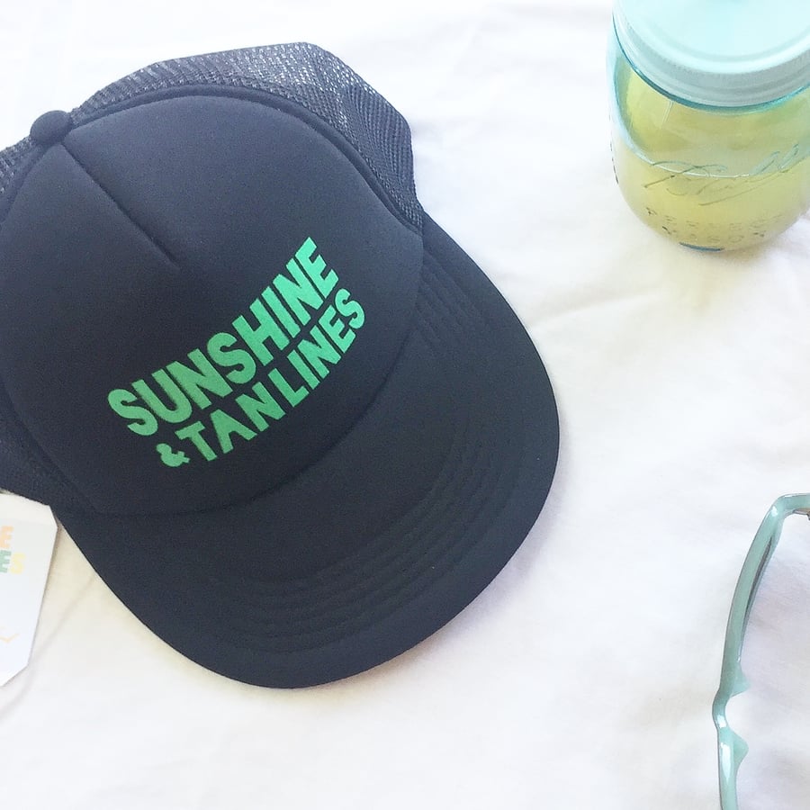 Image of All Black Trucker Hat "Sunshine & Tan Lines"