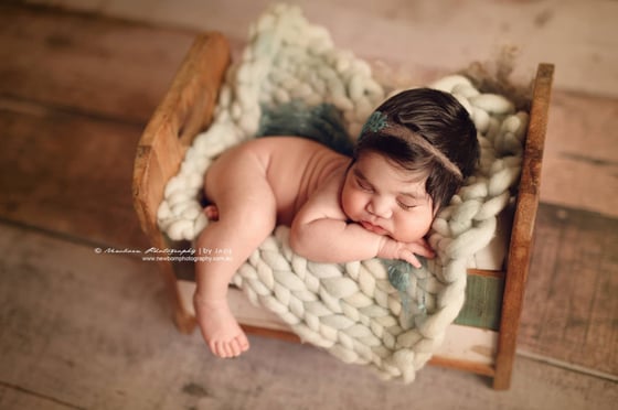 Image of Cora (teal)