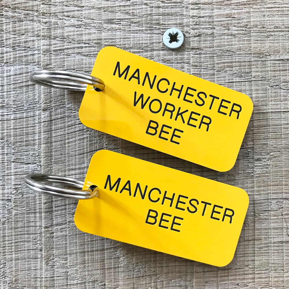 Image of Manchester Worker Bee locker keyring in Yellow + Black