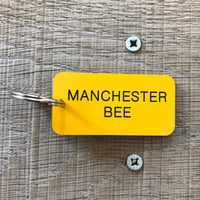 Image 3 of Manchester Worker Bee locker keyring in Yellow + Black