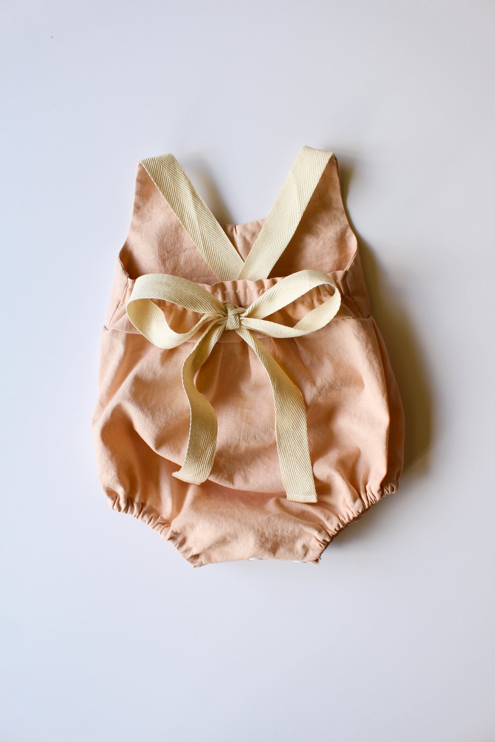 Image of Linen & Lace Back-Tie Romper-- Peach