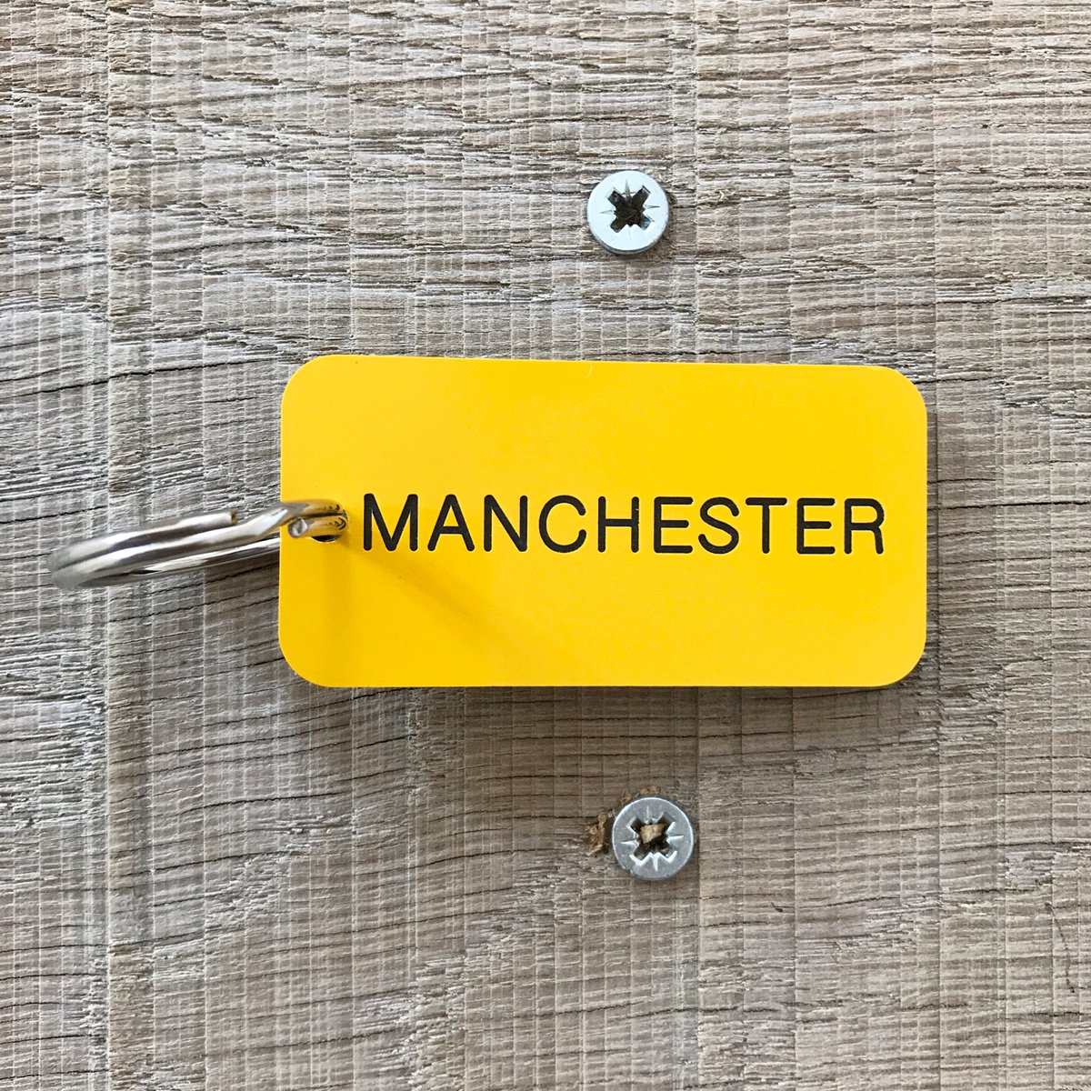 Image of Manchester MCR locker keyring in yellow + black