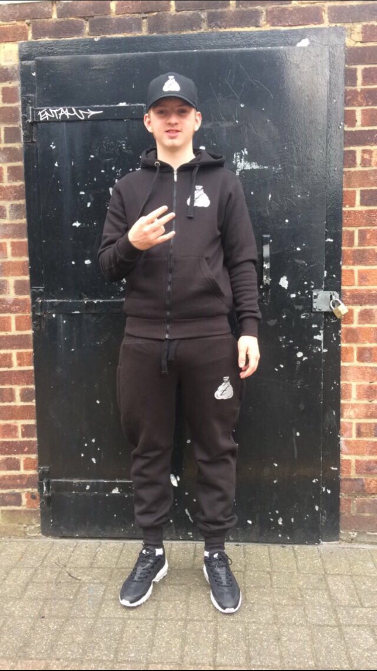 black reflective tracksuit