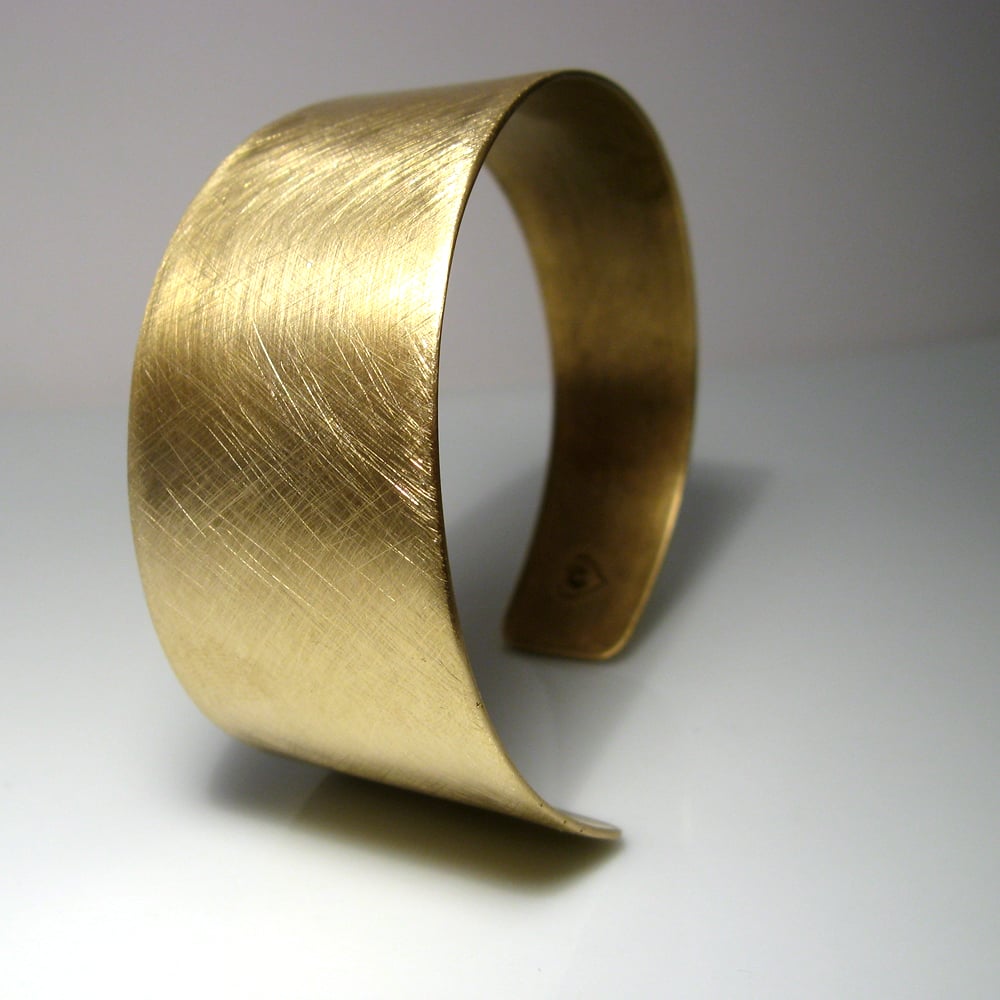 Image of asymmetrical cuff. bracelet. brass.