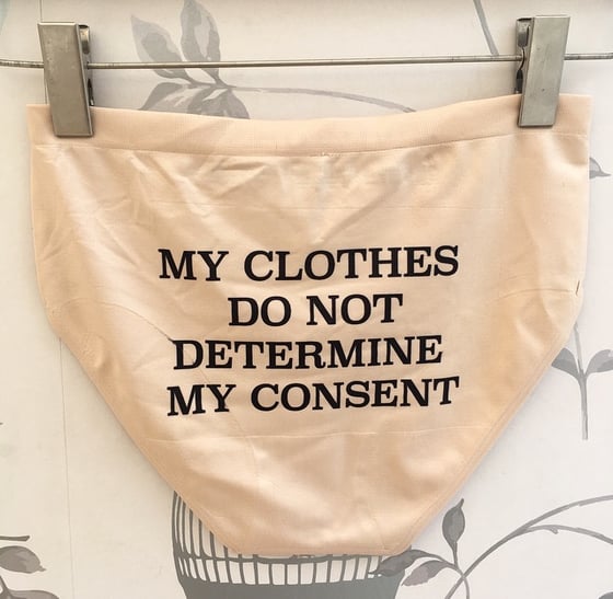 Image of 'MY CLOTHES DO NOT DETERMINE MY CONSENT' HIGH WAISTED SLOGAN PANTS