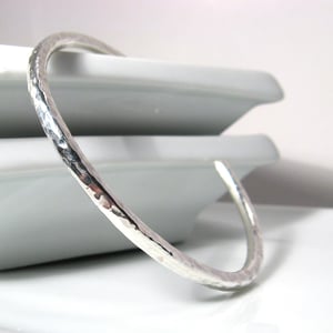 Image of thick ripple cuff. bracelet. sterling silver.
