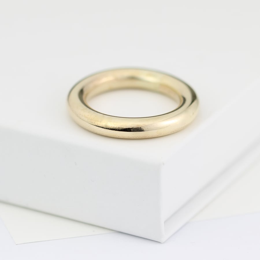 Image of chunky gold ring, gold wedding ring