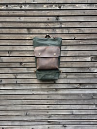 Image 2 of Day pack in waxed canvas with leather outside pocket and zipper closing