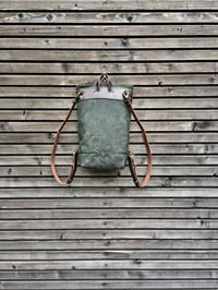 Image 5 of Day pack in waxed canvas with leather outside pocket and zipper closing
